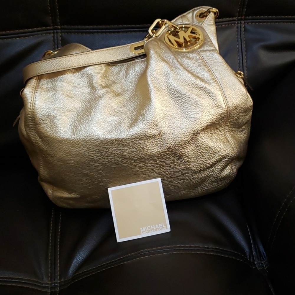 Michael Kors gold hobo handbag